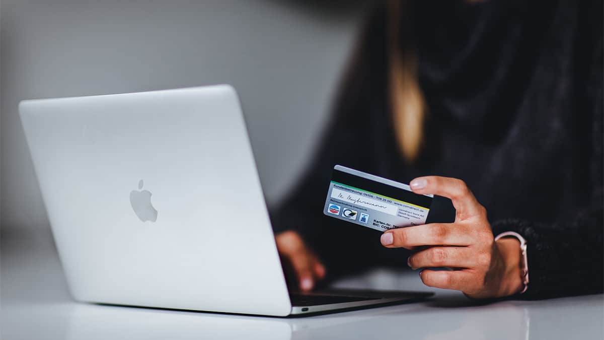 Person making payment on a computer